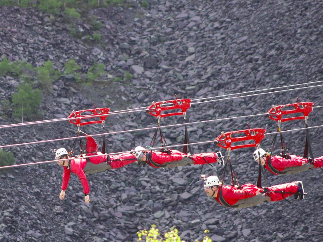 Me (Front, arms raised) and my mother in law (Just behind me) on the zipslide.